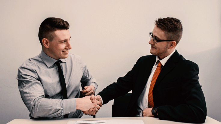 Hiring Manager Shaking Hands With Job Candidate